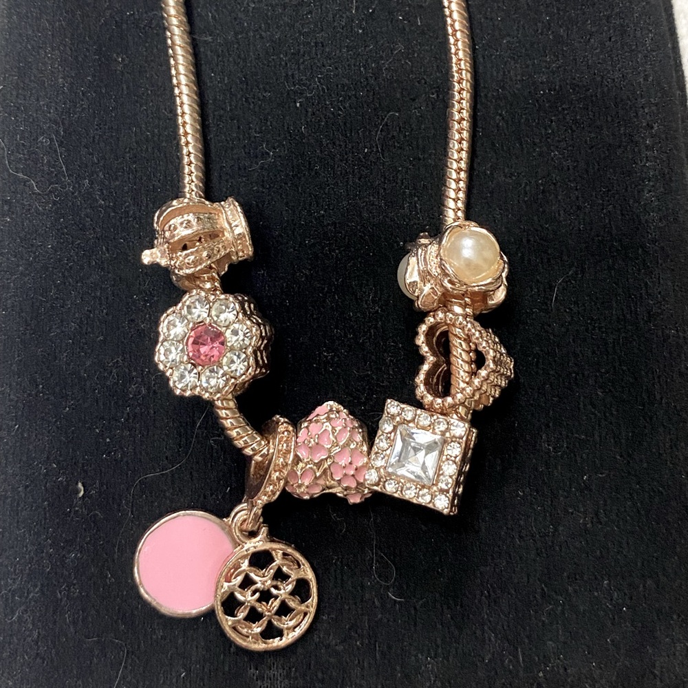 Different Charmed necklace and 10’ chain